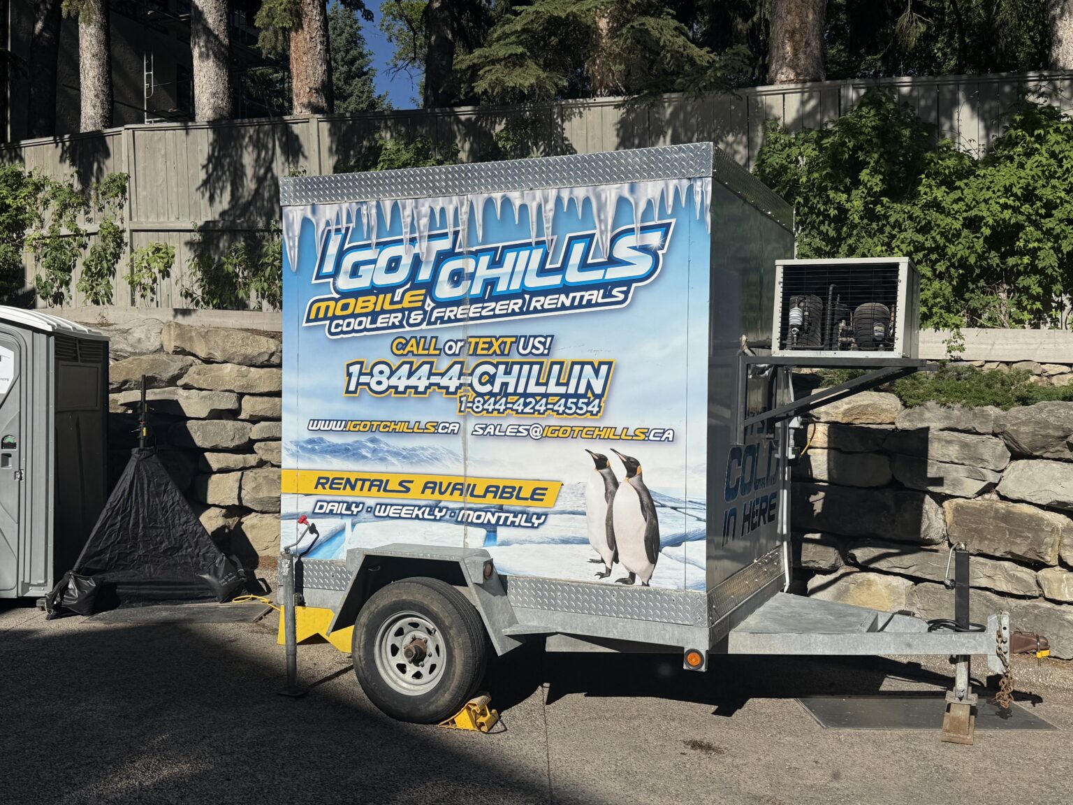 I Got Chills 7' × 8' dual cooler and freezer refrigerated trailer parked on site in Alberta